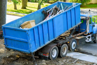 a Dump Truck half full of junk in Fillmore, MO